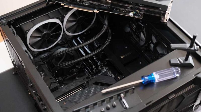 PC building - open computer case with parts still to be installed