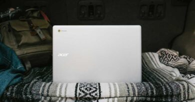 Acer Chromebook on a blanket in bed