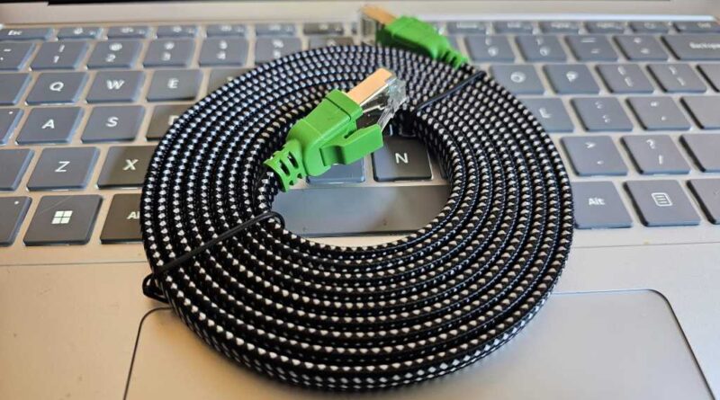 Cat8 Ethernet cable on keyboard