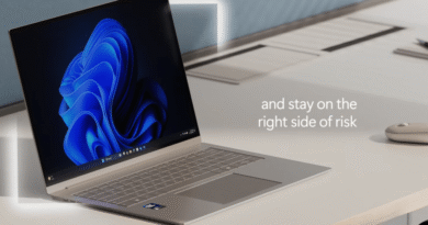 Windows 11 laptop ad. Text: "and stay on the right side of risk"