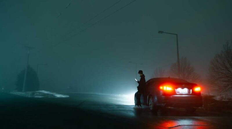 Broken-down car by the side of the road