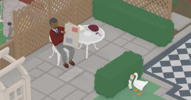 Goose hiding behind bush with a purloined sock