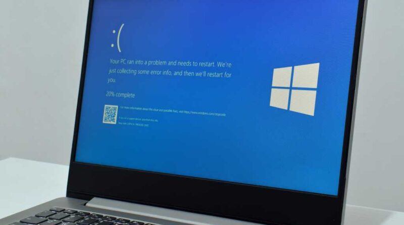 Windows 11 laptop with Blue Screen of Death BSOD hero