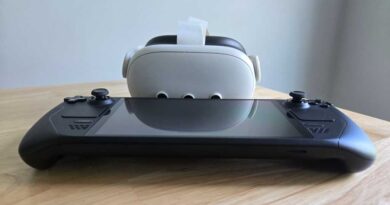Meta Quest 3 VR headset and Steam Deck on table