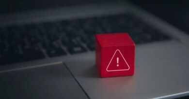 Computer error visualized as a Toy Block placed upon a Laptop keyboard