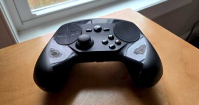 Steam Controller on corner of a wooden desk