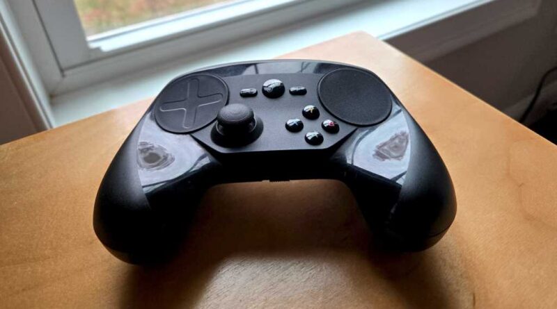 Steam Controller on corner of a wooden desk