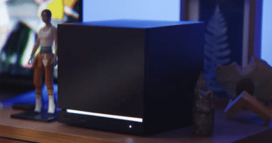 Steam Machine (2026) with black faceplate on a desk