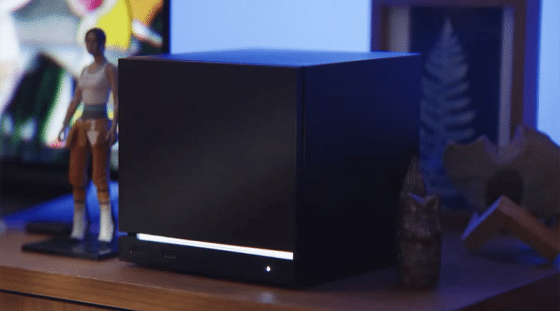 Steam Machine (2026) with black faceplate on a desk