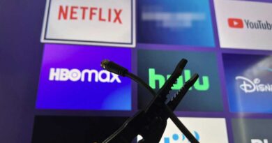 Roku home screen with a cord being cut in front of it