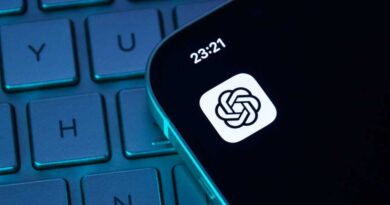 ChatGPT app icon on iPhone sitting on top of darkened keyboard