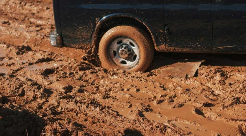 car stuck in sloppy mud