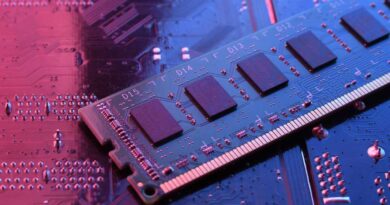 RAM memory stick module exposed and sitting on a circuit board