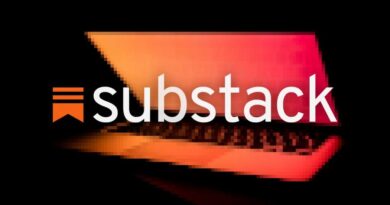 Substack logo on a blurred background of a laptop halfway closed