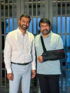 Why is Mega Star wearing a hand belt