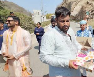 Vijay Devarakonda and Rashmika Mandanna distribute sweets to media