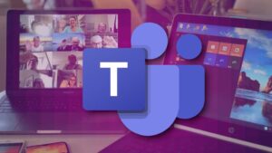 Microsoft Teams logo in front of laptop with video conference