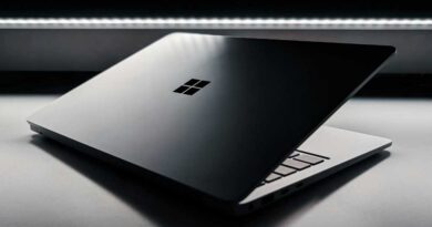 Windows 11 laptop half-closed with dramatic lighting