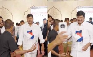 Rajendra Prasad pushes away a fan