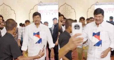 Rajendra Prasad pushes away a fan