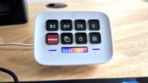 Elgato Stream Deck Neo on wooden desk