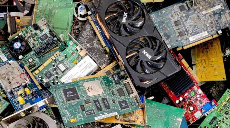 Used PC components hardware e-waste in a dump recycle