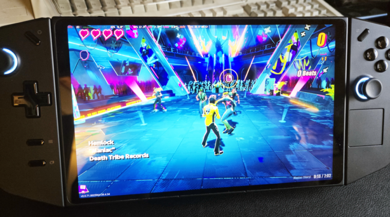 Lenovo Legion Go running Dead as Disco, with old keyboard in the background