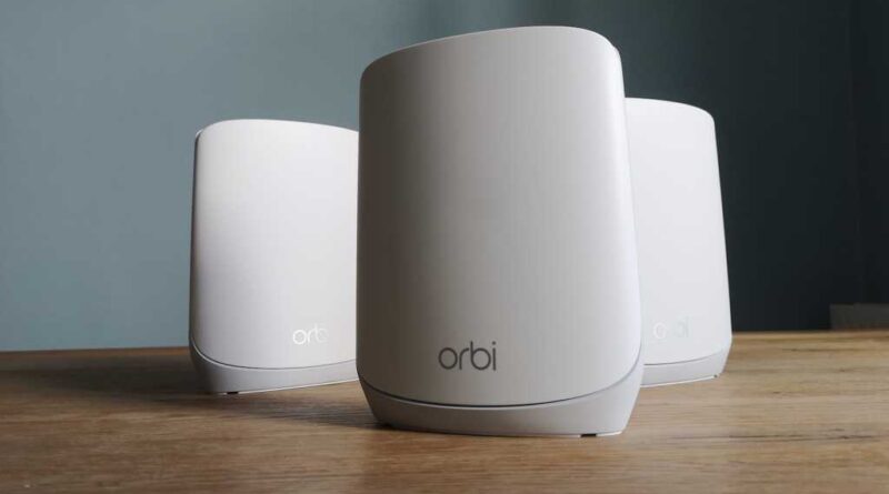 A Netgear Orbi RBR760 router and two RBS760 satellites, viewed from the front