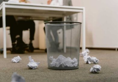 Paper in a wastebasket (and outside on the ground too)