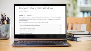 Microsoft Windows 11 keyboard shortcuts website on a laptop