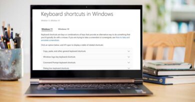 Microsoft Windows 11 keyboard shortcuts website on a laptop