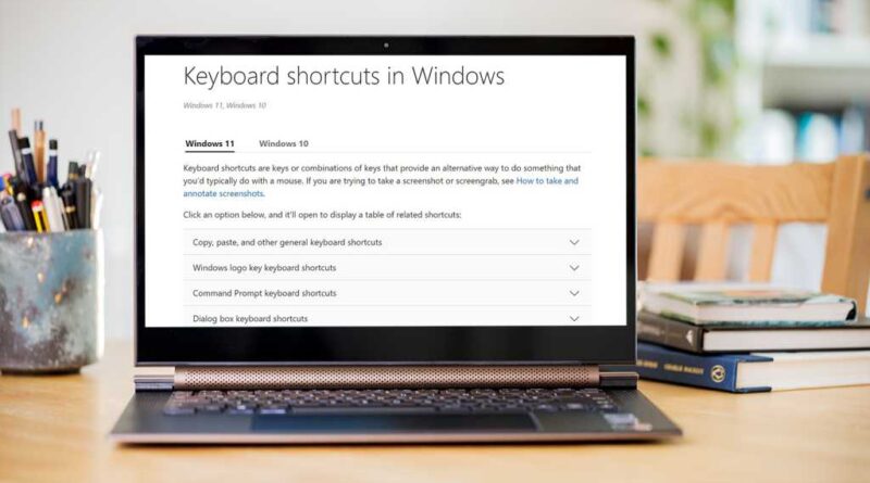 Microsoft Windows 11 keyboard shortcuts website on a laptop