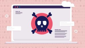 Computer virus - Laptop with red screen and skull showing danger and malware alert.