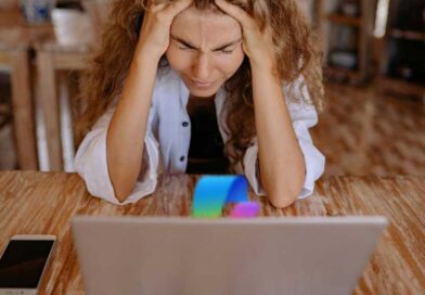 oh god why copilot why woman frustrated with laptop