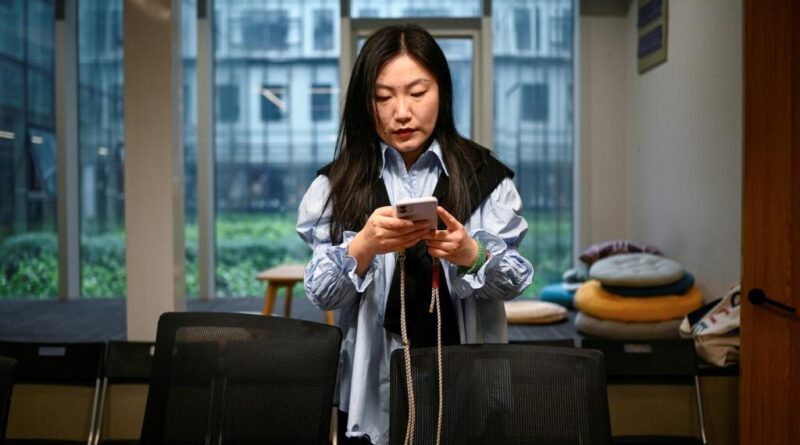 Young Chinese use AI to launch one-person firms over job anxiety