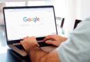 Man typing on laptop with Google Chrome on screen