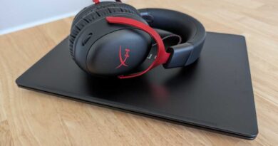 HP Omen Transcend laptop and headphones