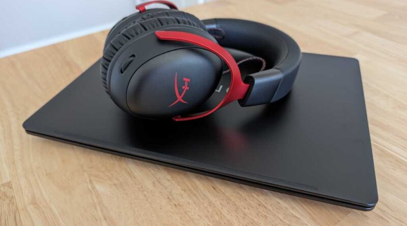 HP Omen Transcend laptop and headphones