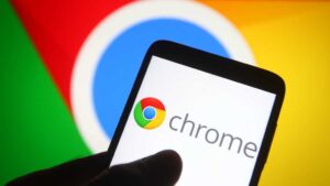 Chrome logo on phone in front of Chrome logo on screen