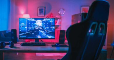Gaming PC rig with RGB workstation and empty gaming chair
