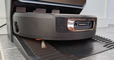 Narwal Flow 2 robot vacuum mop resting in dock