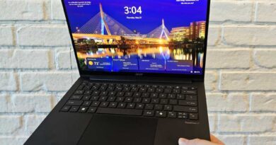 Acer TravelMate P6 14 AI in hand
