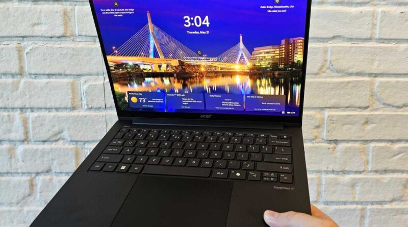 Acer TravelMate P6 14 AI in hand