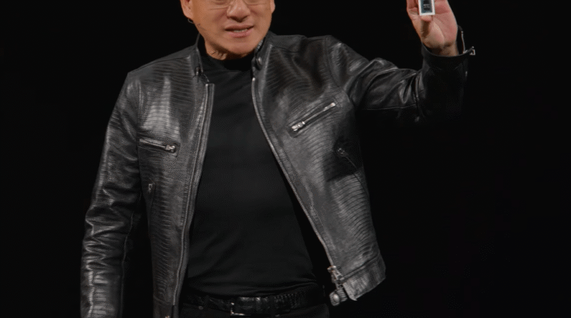 Nvidia Jensen Huang holds up RTX Spark chip