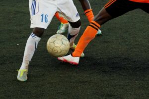 two players with a soccer ball