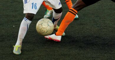 two players with a soccer ball
