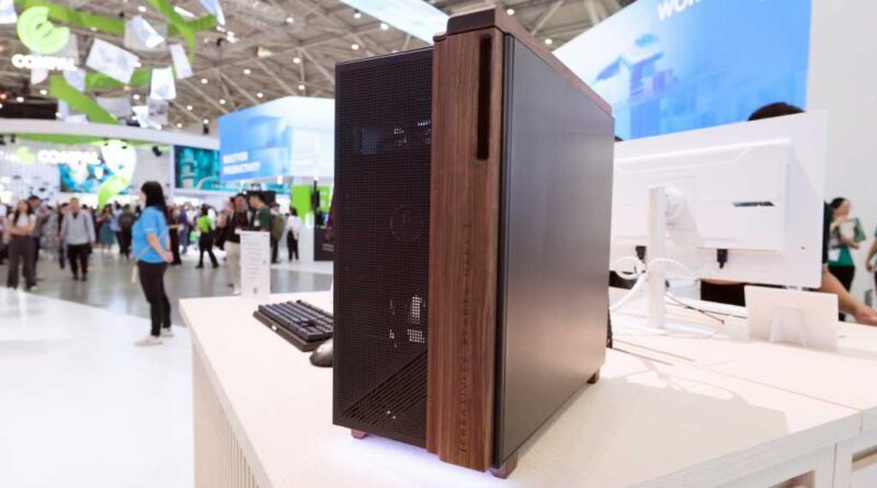 Gigabyte Aorus C400 Glass on a white desk at Computex 2026