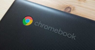 Chromebook logo closeup on black laptop lid hero