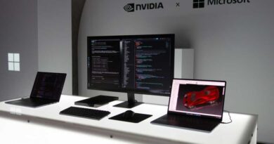 Surface Laptop Ultras flanking a Surface RTX Spark Dev Box