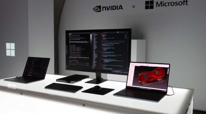 Surface Laptop Ultras flanking a Surface RTX Spark Dev Box